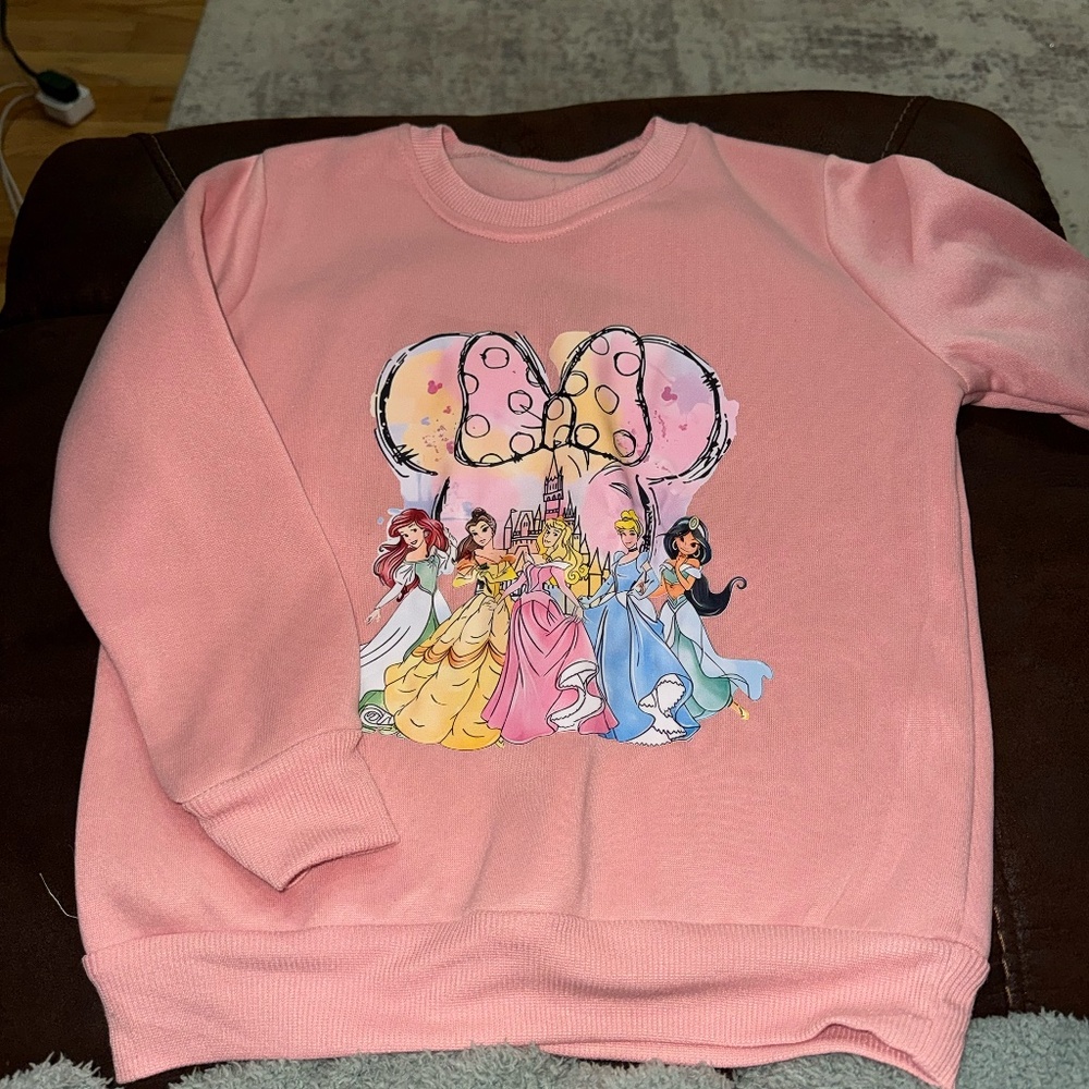 2 disney Sweatshirts and matching pants to one set.